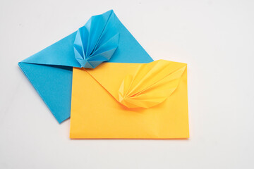 Paper envelope made of paper on a white background. Origami. Paper crafts