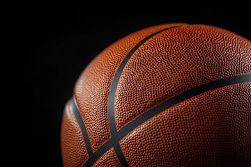 Close-up of a Basketball on Black Background for Sport Content