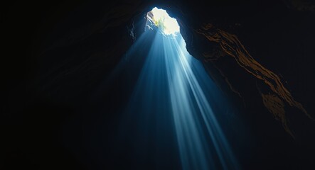 Light in the dark, Divine like light sunbeam coming to dark cave giving hope