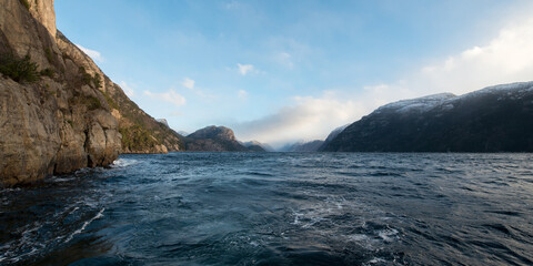 View into a deep dark blue Norwegian fjord