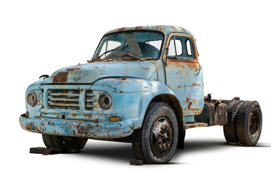 Old, rusty blue truck with a weathered appearance isolated on white background.