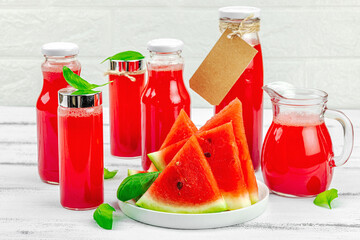 Homemade watermelon kombucha. Healthy probiotic drink, kvass with basil leaves. Fermented beverage