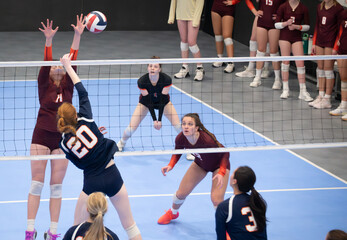 Volleyball players waiting to play defense