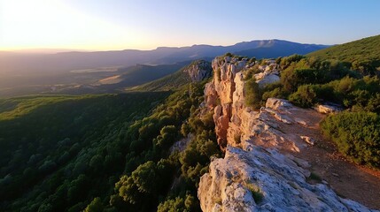 Breathtaking View of Rocky Cliffside Overlooking Lush Green Valleys and Mountains at Sunset : Generative AI