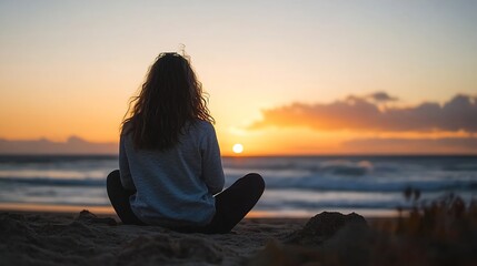 Fototapeta premium Silhouette of a woman sitting on the beach during sunset reflecting on life and tranquility : Generative AI