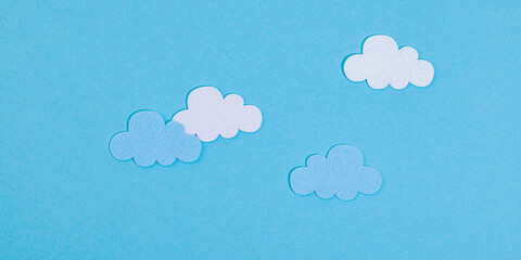 Weather symbols concept. Crocheted sun, clouds and moon. Handmade props, hobby, crafted decor