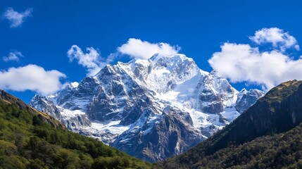 Fototapeta premium Majestic mountain landscape with snow capped peaks under a vibrant blue sky and fluffy clouds : Generative AI
