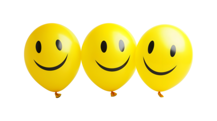 Three yellow balloons with smiling faces