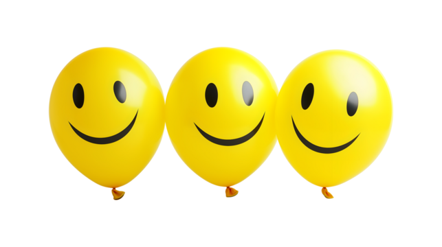 Three yellow balloons with smiling faces