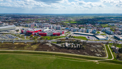 Aerial drone view of Park Jarun in Zagreb, showcasing stunning blue water, lush greenery, and the...