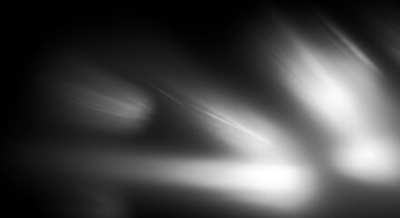 Abstract monochrome gradient with blurred light effects