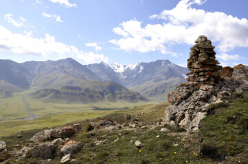 A stone tower on the mountainside to help travelers, shepherds, and tourists find their way. A...