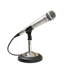 Silver microphone on a stand, isolated on black background.