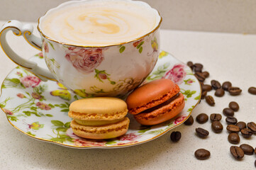 Elegant Coffee Moment – Vintage Cup with Macarons