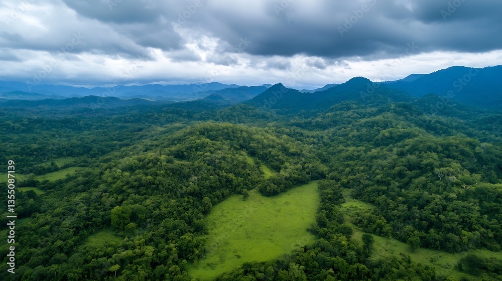 Aufkleber aerial view of vast green hills and lush forests under cloudy sky in tranquil wilderness : generativ