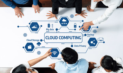 A diverse team collaborates on cloud computing concepts using icons that represent data privacy, backup, cloud storage, and big data, showcasing modern business innovation. Amity