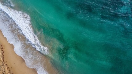 Aerial view of vibrant turquoise ocean waves gently breaking on sandy beach for summer vacation concept : Generative AI