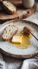 Closeup of Buttered Toast with Honey on Speckled Plate