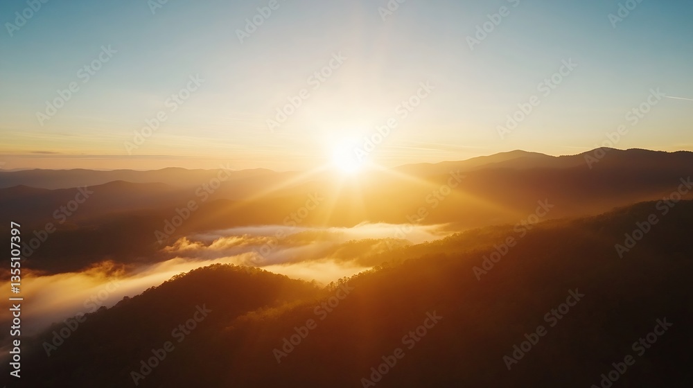 Poster breathtaking view of a sunrise over misty mountains creating an ethereal atmosphere of hope and natu