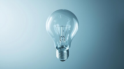 A clear light bulb against a simple background.