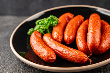 Smoked sausages pork meat beef dish fresh delicious gourmet food background on table rustic food top view copy space