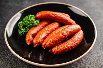 Smoked sausages pork meat beef dish fresh delicious gourmet food background on table rustic food top view copy space