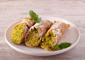 Cannoli with ricotta and pistachio