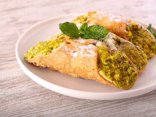 Cannoli with ricotta and pistachio