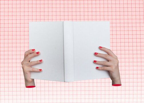 Book open in hand, showing fingers holding the pages, representing learning and education. Female - Powered by Adobe