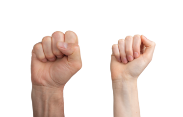 Clenched fist raised in victory, symbolizing strength and power. Male and female adults showing a