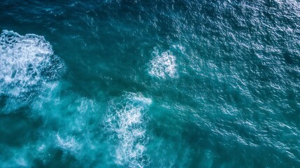 Fototapeta premium Aerial view of vibrant turquoise ocean water with white foam highlighting natural beauty and tranquility : Generative AI