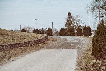 winding asphalt road vintage look