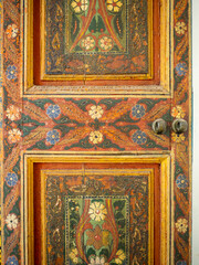 Detail of a painted wooden door of Bahia Palace, Marrakesh
