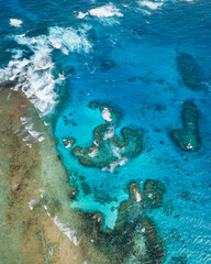 Stunning Aerial View of Abstract Ocean Patterns – A Mesmerizing Display of Fluid Lines, Rich Colors, and Natural Textures, Showcasing the Ocean’s Beauty from Above!