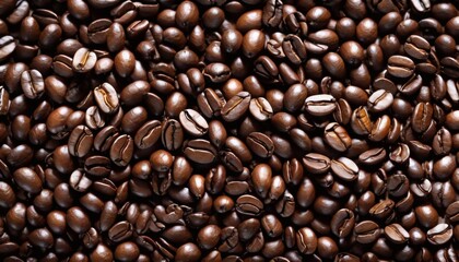 Naklejka premium Close-up of roasted coffee beans with rich texture and dark aroma