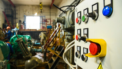 Closeup of control panel at the pumping station, focus forward