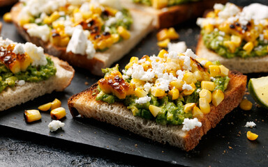 Grilled corn and avocado sourdough toast with soft goats cheese