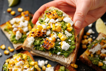 Grilled corn and avocado sourdough toast with soft goats cheese