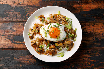 Hawaiian Loco Moco with hamburger, fried egg and brown mushroom gravy
