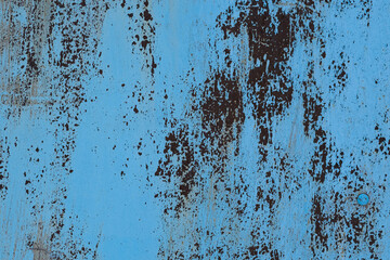 Rusty metal surface with blue paint. Abstract background and texture for design.