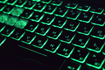 Computer keyboard with green keys