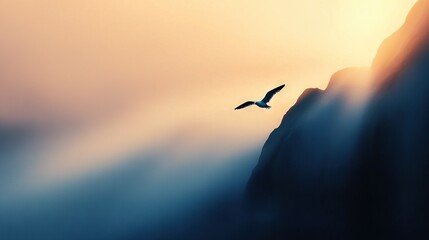   A bird soars above the mountaintop, bathed in sunlight