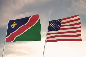 Relations between the countries of the United States of America USA and NAMBIA represented by the concept of two flags waving against a cloudy sky.3d render.