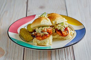 shrimp sliders with coleslaw and an Asian style BBQ sauce