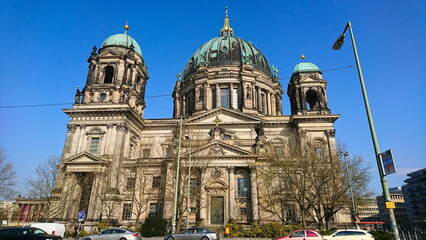 The stunning Berlin Cathedral showcases its impressive Baroque architecture with ornate domes