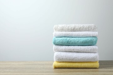 Stack of bath towels on the table