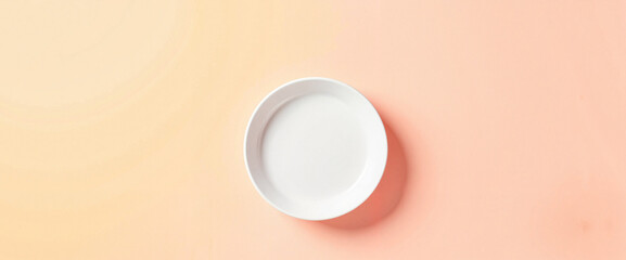 Minimalist ceramic plate on pastel background, artistic simplicity