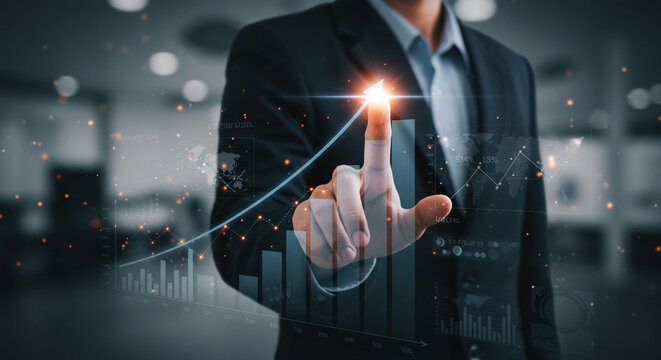 A business professional in a dark suit interacts with a futuristic digital financial interface, symbolizing market growth and data analytics.