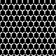 Repeated black interlocking regular hexagons tessellation background. Seamless surface pattern design with bee combs. Hexagonal grid motif. Honeycomb wallpaper. White three pronged blocks. Vector art.