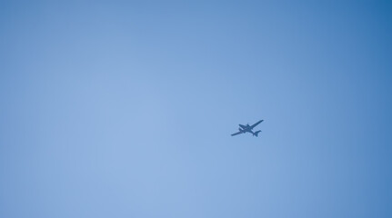 Qinetiq Diamond DA62 MPP aircraft equipped for Intelligence, Surveillance, and Reconnaissance (ISR) flying in a deep blue sky